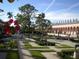 Elegant museum with manicured grounds, featuring symmetrical gardens and classical architecture at 4257 Hearthstone Dr, Sarasota, FL 34238