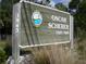 Oscar Scherer State Park sign showcases the natural beauty and environmental protection area at 4257 Hearthstone Dr, Sarasota, FL 34238