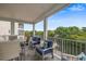 Outdoor balcony with comfortable seating offering picturesque water views at 4321 Marina View Way, Cortez, FL 34215