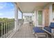 Inviting outdoor balcony with comfortable seating and tranquil water views at 4321 Marina View Way, Cortez, FL 34215