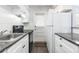 Efficient kitchen has white appliances, lots of cabinet space, and modern countertops at 4507 9Th W St # A2, Bradenton, FL 34207