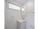 Cozy bathroom with modern vanity, mirrored cabinet, and convenient towel rack at 5213 Bel Air Ave, Sarasota, FL 34234