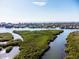 Picturesque aerial view of the coastal waterway and lush mangrove islands at 5450 Eagles Point Cir # 404, Sarasota, FL 34231