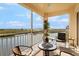 Relaxing balcony with comfortable seating and scenic water views at 5450 Eagles Point Cir # 404, Sarasota, FL 34231