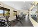 Well-equipped gym featuring modern weightlifting equipment and ample natural light at 5450 Eagles Point Cir # 404, Sarasota, FL 34231