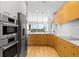 Modern kitchen with stainless steel appliances, sleek countertops, and ample cabinet space at 5450 Eagles Point Cir # 404, Sarasota, FL 34231