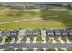 An aerial shot showcasing a residential neighborhood with a view of a nearby community park at 5532 Summit Gln, Bradenton, FL 34203