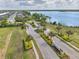 Grandview community entrance features manicured landscaping, showcasing the community's proximity to the lake at 5532 Summit Gln, Bradenton, FL 34203