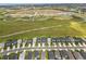 A beautiful aerial view of the community with vast greenery, showcasing this house in a prime location at 5532 Summit Gln, Bradenton, FL 34203