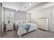 Cozy bedroom featuring stylish decor, a comfortable bed, and lots of natural light at 5532 Summit Gln, Bradenton, FL 34203