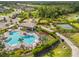 Aerial image highlighting community pool, cabana, playground, and basketball court amenities at 5532 Summit Gln, Bradenton, FL 34203