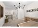 Upstairs hallway boasts a view of the hall bath, stylish decor, and natural light at 5532 Summit Gln, Bradenton, FL 34203