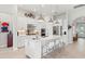 Bright kitchen features stainless appliances, island with seating, and lots of storage at 5740 Eagle Creek Rd, Sarasota, FL 34238