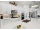 Beautiful kitchen features stainless appliances, quartz countertops, and decorative accents at 5740 Eagle Creek Rd, Sarasota, FL 34238