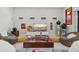 Bright living room with modern furniture, accent lighting, and decorative art at 5740 Eagle Creek Rd, Sarasota, FL 34238