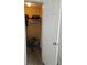 Walk-in closet featuring a shelf, clothes hanger and storage space at 5849 Wagon Wheel Dr, North Port, FL 34291