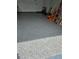 Clean garage featuring a newly finished epoxy floor, offering a durable and attractive surface at 5849 Wagon Wheel Dr, North Port, FL 34291