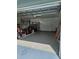 Spacious two-car garage with an epoxy floor at 5849 Wagon Wheel Dr, North Port, FL 34291