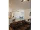 Open-concept living and dining areas with wood-look floors at 5849 Wagon Wheel Dr, North Port, FL 34291