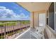 Balcony with seating and beautiful golf course views at 601 Longboat Club Rd # 504S, Longboat Key, FL 34228