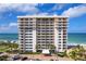 An impressive beachfront building with multiple floors and ocean views at 601 Longboat Club Rd # 504S, Longboat Key, FL 34228