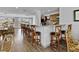 Large, open kitchen and bar area with plenty of seating and cabinet space at 601 Longboat Club Rd # 504S, Longboat Key, FL 34228