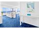 Bright living room with ocean views, comfortable seating, and stylish decor at 601 Longboat Club Rd # 504S, Longboat Key, FL 34228