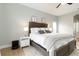 Relaxing main bedroom with a plush king bed, soft rug, and fresh decor at 6140 Bobby Jones Ct, Palmetto, FL 34221