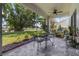 Relaxing screened patio providing ample space for seating and potted plants at 6140 Bobby Jones Ct, Palmetto, FL 34221