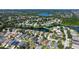 Overhead aerial of a comfortable residential community with beautiful bodies of water surrounded by lush, green landscaping at 6213 Willet Ct, Lakewood Ranch, FL 34202