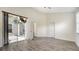 Bedroom featuring a ceiling fan, sliding glass doors to a porch, and wood-style flooring at 6213 Willet Ct, Lakewood Ranch, FL 34202