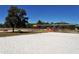 Community park featuring a volleyball court, playground, and walking paths for recreation and relaxation at 6213 Willet Ct, Lakewood Ranch, FL 34202