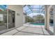 Relaxing screened-in patio overlooking a sparkling pool, perfect for outdoor entertaining at 6213 Willet Ct, Lakewood Ranch, FL 34202