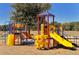 A colorful playground with slides and a climbing structure at 6213 Willet Ct, Lakewood Ranch, FL 34202