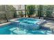 A close up view of the spa with a lovely blue tile and flowing water at 6213 Willet Ct, Lakewood Ranch, FL 34202