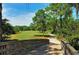 The community walking bridge leads to winding paths through lush greenery at 6213 Willet Ct, Lakewood Ranch, FL 34202