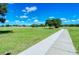 Well-maintained walking path through a lush recreational area, ideal for exercise and enjoying the scenic green space at 6213 Willet Ct, Lakewood Ranch, FL 34202