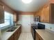 Practical kitchen featuring a stainless steel microwave and clean finishes at 6618 Kenwood Dr, North Port, FL 34287