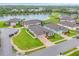 An aerial shot of a lovely community with lush greenery, serene lakes, and well-maintained homes at 6636 35Th E Ct, Sarasota, FL 34243