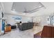 Inviting living room features recessed lighting, a ceiling fan, and an open floor plan for comfortable living at 6636 35Th E Ct, Sarasota, FL 34243