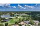 Aerial view of the home, showcasing its location near the golf course at 6641 Saint James Xing, University Park, FL 34201