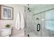 Elegant bathroom with a glass shower, modern fixtures, and clean design at 6641 Saint James Xing, University Park, FL 34201
