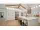 Bright kitchen showcases a large island, stainless steel appliances, and modern pendant lighting at 6641 Saint James Xing, University Park, FL 34201