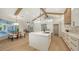 Spacious kitchen with stainless appliances, large island, breakfast nook, and decorative lighting at 6641 Saint James Xing, University Park, FL 34201