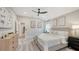 Large main bedroom with a plush bed, ensuite bathroom, and plenty of space at 6641 Saint James Xing, University Park, FL 34201