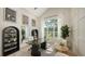Bright office featuring large windows, modern décor, and stylish bookshelves at 6641 Saint James Xing, University Park, FL 34201