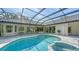 Inviting pool area with a spa and outdoor seating at 6641 Saint James Xing, University Park, FL 34201
