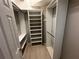 This closet has built-in storage systems with shelving and hanging rods at 6839 Turnberry Isle Ct, Lakewood Ranch, FL 34202