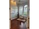 Bright office featuring hardwood floors, a ceiling fan, and French doors at 6839 Turnberry Isle Ct, Lakewood Ranch, FL 34202