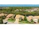 Charming single-Gathering home boasts a well-manicured lawn, mature trees, and a private backyard oasis at 7081 Grassland Ct, Sarasota, FL 34241